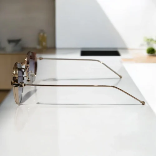 Round Shaped Sunglasses With Greyish Glass & Golden Frame For Unisex - Image 2